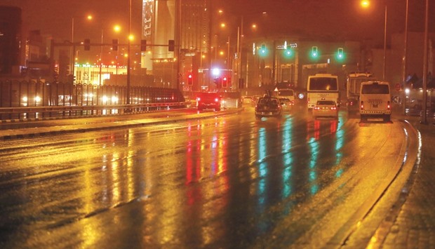 A rain-washed C-Ring Road in Doha yesterday evening. PICTURE: Jayan Orma
