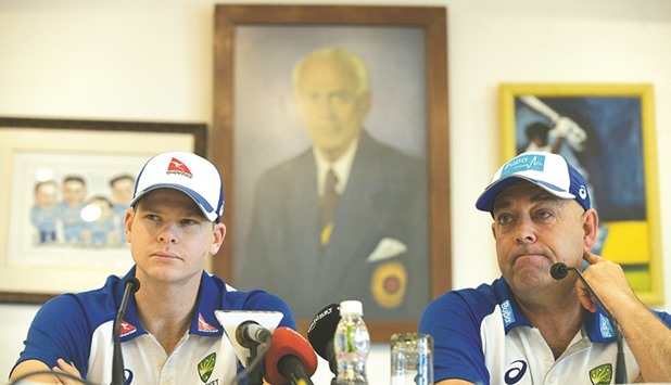 Australia captain Steven Smith (left) and coach Darren Lehmann listen to a question during a press conference in Mumbai yesterday. (AFP)