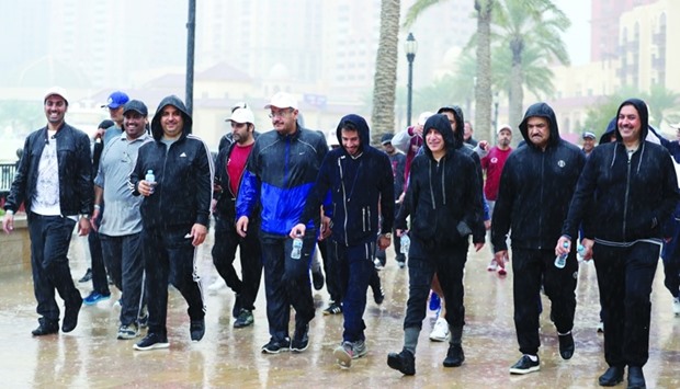 Senior officials from government agencies and UDC, and other dignitaries, led the walkathon at The Pearl-Qatar yesterday as part of the National Sport Day 2017 celebration. PICTURE: Jayaram.