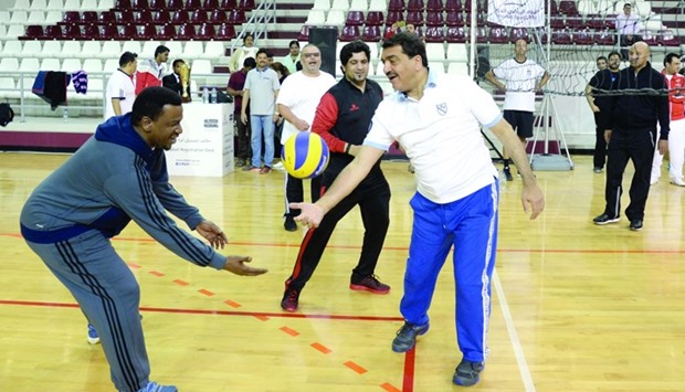 HE Mohamed bin Abdullah al-Rumaihi and Ashghal president Saad bin Ahmad al-Mohannadi participate in a game of volleyball. PICTURE: Thajudheen.