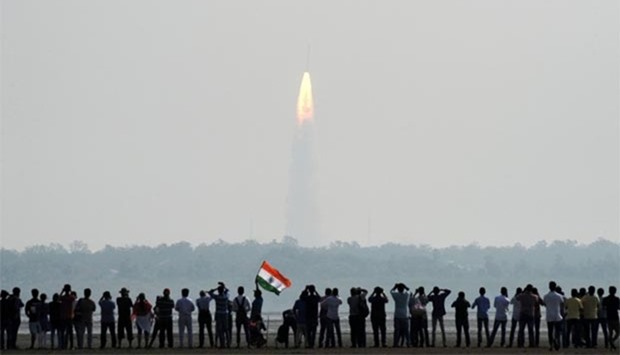 People watch the launch of the Indian Space Research Organisation (ISRO) Polar Satellite Launch Vehicle (PSLV-C37) at Sriharikota on Wednesday.