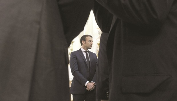 Macron is seen during his visit yesterday to the Notre Dame du2019Afrique Basilica in Algieru2019s Bab el-Oued neighbourhood. He was winding up his two-day visit to Algeria.