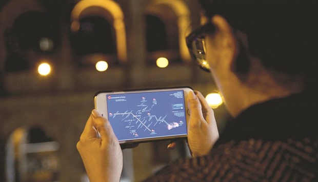 Alonzi looks at the map on her smartphone, showing the police stations closest to each stop in the Italian capital, graphically underlining a message that help is at hand.