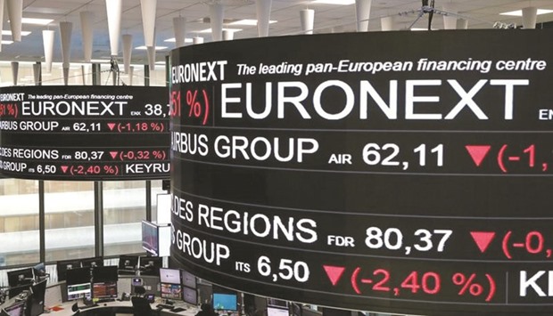 Company stock price information is displayed on screens at the Paris stock exchange, operated by Euronext. The exchange has agreed to buy Paris-based LCH for u20ac510mn ($538mn), but the deal can only go ahead if LSE Group succeeds in merging with Deutsche Boerse, a tie-up regulators will rule on by the end of June.