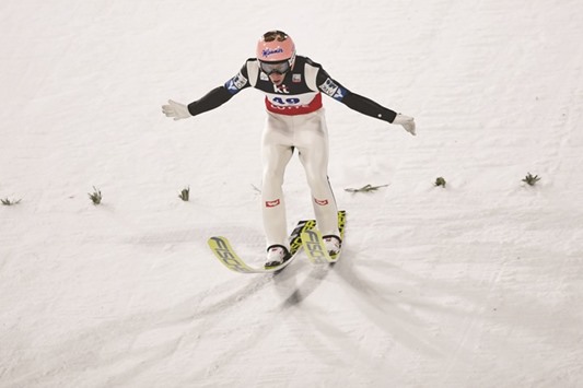 Stefan Kraft of Austria competes during the 1st round of the Large Hill Individual event at the FIS Ski Jumping World Cup in Pyeongchang yesterday. (AFP)
