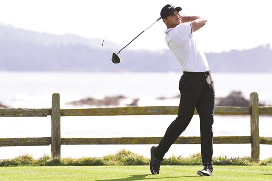 File picture of Jason Day of Australia hitting his tee shot on the 18th hole during the Final Round of the AT&T Pebble Beach Pro-Am at Pebble Beach Golf Links.