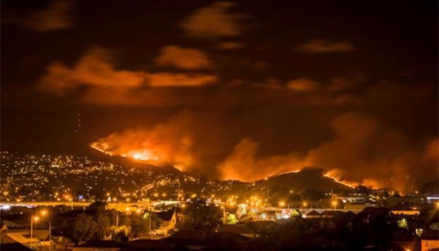 Wildfires threaten a suburb of Christchurch on New Zealand's South Island on Wednesday.