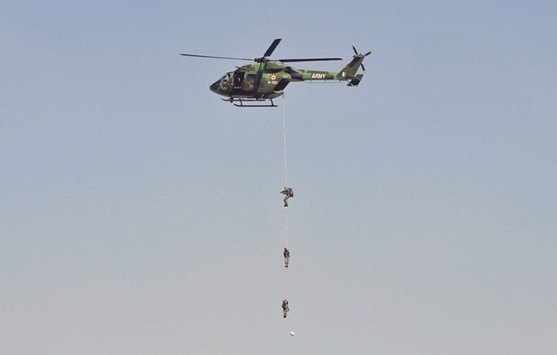 Soldiers demonstrate their skills during the Aero India show at the Yelahanka Air Force Station in Bengaluru yesterday.