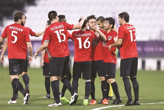 Al Rayyan players celebrate during their match against Muaither yesterday.