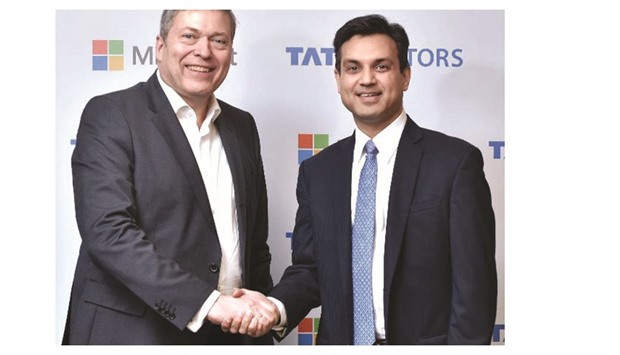 Guenter Butschek, Tata Motorsu2019 CEO and managing director (left) and Anant Maheshwari, president, Microsoft India, announcing the collaboration to redefine the connected experience for automobile users at a press conference in Mumbai on Thursday.