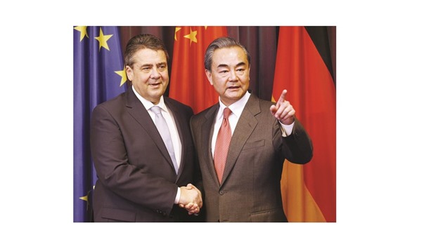 Chinese Foreign Minister Wang Yi and his German counterpart Sigmar Gabriel meet for talks prior to the G-20 Foreign Ministers meeting in Bonn, Germany.