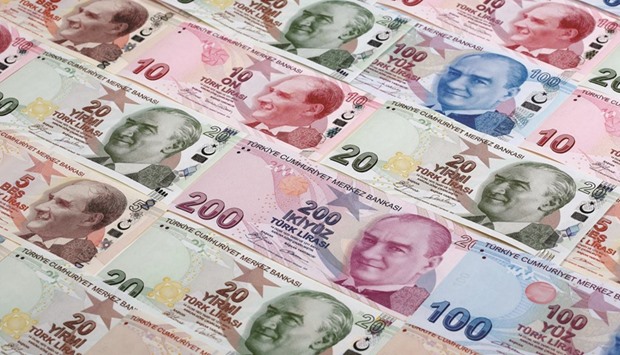 Turkish lira banknotes are seen in this illustration. Turkeyu2019s regulator has been rolling out extraordinary measures since the beginning of the year as it tries to support the lira, which has recovered from record lows following a 17% drop in 2016.