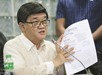 Justice Minister Vitaliano Aguirre shows the documents filed in the local court against Senator Leila de Lima during a news conference at the National Bureau of Investigation (NBI) headquarters in Metro Manila yesterday.