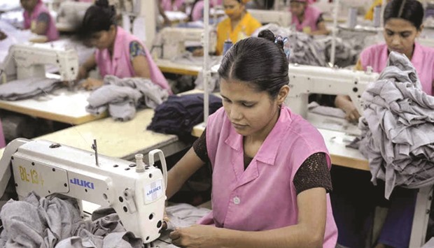 Workers at a garment factory in Dhaka. In Bangladesh, garment makers typically charge in US dollars. For UK retailers, that means import costs are rising in line with sterlingu2019s 16% slump since Britainu2019s June vote to leave the European Union. Reluctant to raise prices for shoppers, big high street brands are squeezing suppliers instead.