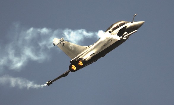 An aircraft manoeuvres at the Yelahanka Air Force Station in Bengaluru.