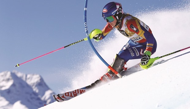 Mikaela Shiffrin (also below) of the USA in action in the womenu2019s slalom event during the FIS Alpine Skiing World Championships, in St. Moritz, Switzerland yesterday.