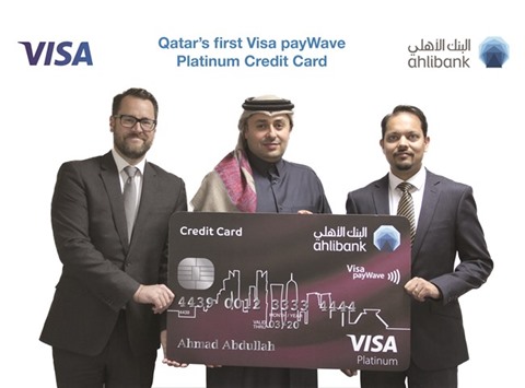 Hassan AlEfrangi (centre) with others during the launch of Ahlibanku2019s first Visa Platinum credit card in Qatar powered with Visa payWave technology.