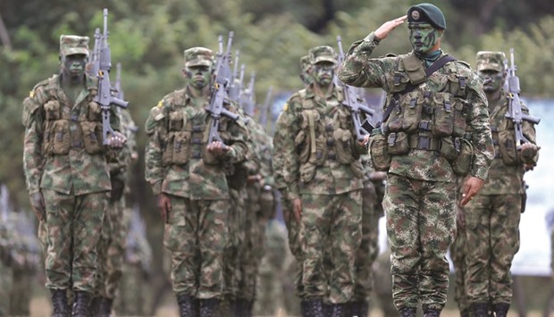 Colombian soldiers during the graduation ceremony of soldiers in Nilo, Colombia. The soldiers will be deployed to occupy territories formerly controlled by Farc rebels.