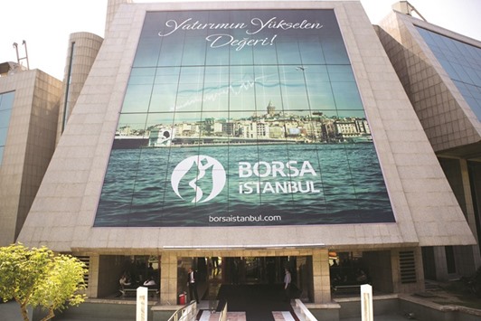 The main entrance to the Borsa Istanbul, the stock exchange, is seen in Istanbul (file). The Borsa Istanbul 100 Index rose 13% by mid February, buoyed by a combination of improved sentiment toward emerging markets, creative steps by the Turkish central bank to support the lira and stock valuations that drew investors to local stocks.