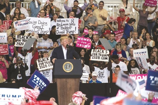 President Donald Trump addresses a rally at the Orlando Melbourne International Airport in Melbourne, Florida, on Saturday.