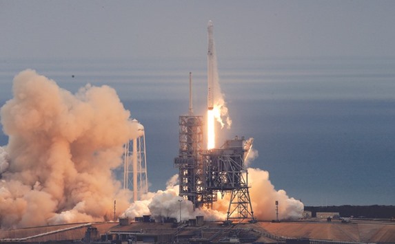 A SpaceX Falcon 9 rocket lifts off on a supply mission to the International Space Station from historic launch pad 39A at the Kennedy Space Center in Cape Canaveral yesterday morning.