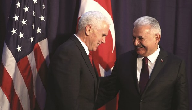 Pence and Yildirim before their meeting at the 53rd Munich Security Conference on Saturday.
