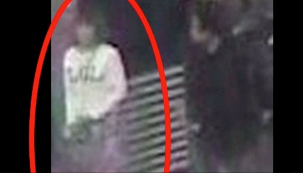 A woman who was detained at Kuala Lumpur airport, identified from CCTV footage at the airport and who was alone when she was apprehended, according to police in a statement, is seen circled in red in this still frame taken from video released February 16, 2017, showing CCTV footage courtesy of Star TV