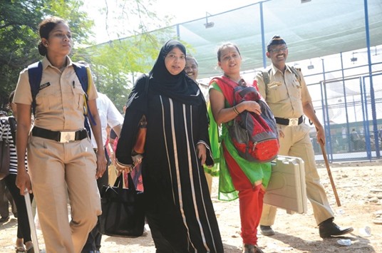 Poll personnel leave for their respective booths on the eve of Brihanmumbai Municipal Corporation (BMC) polls in Mumbai yesterday.