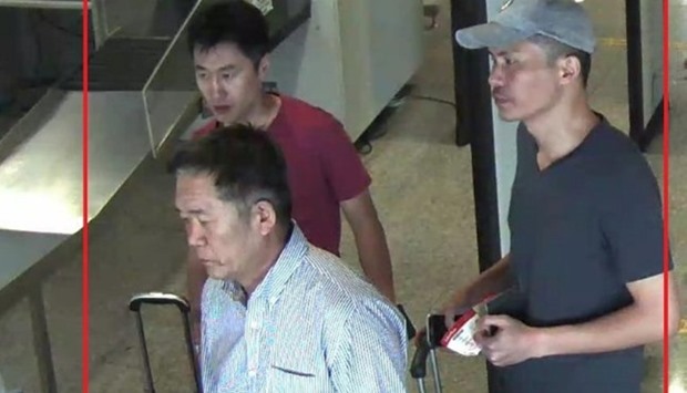 North Korean suspects Ri Jae Nam (front L), Hong Song Hac (back L) and Ri Ji Hyun (R) are seen in this undated handout released by the Royal Malaysia Police.