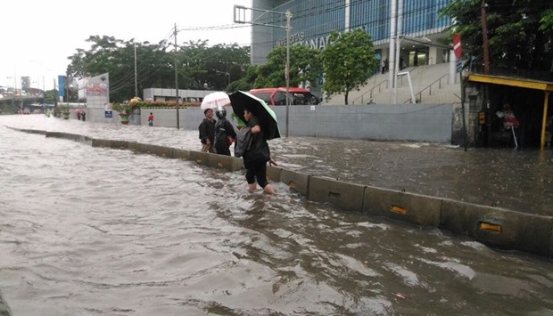 The flooding inundated major roads in parts of Jakarta. Picture courtesy: The Straits Times