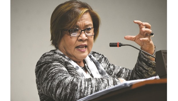 Senator Leila De Lima gestures as she speaks during a press conference at the senate in Manila yesterday.