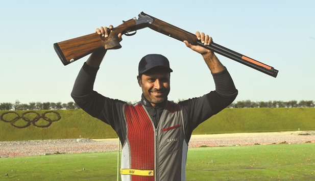 Qataru2019s Nasser al-Attiyah celebrates after clinching a silver medal in the skeet event during the Qatar Open shooting at the Lusail Shooting Range yesterday. PICTURE: Nasar T K