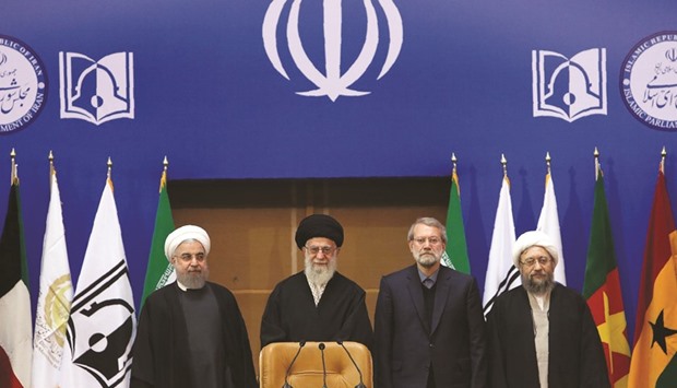 This handout photo provided by the official website of the Centre for Preserving and Publishing the Works of Iranu2019s supreme leader, Ayatollah Ali Khamenei, yesterday shows (from left) Iranian President Hassan Rouhani, supreme leader Ayatollah Ali Khamenei , Parliament Speaker Ali Larijani and judiciary chief Sadeq Larijani attending the sixth international conference in support of Palestinian uprising, in Tehran.