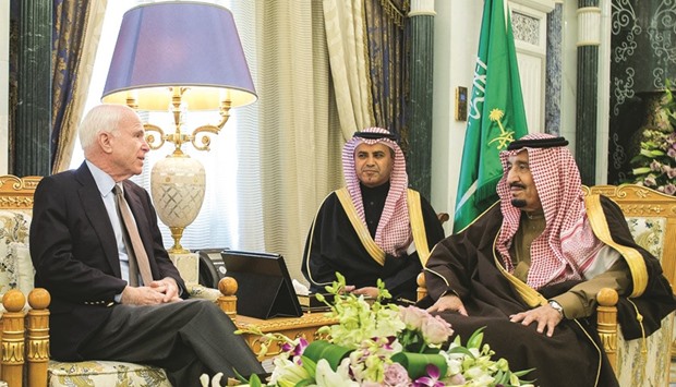A handout picture provided by the Saudi Royal Palace yesterday, shows Saudi King Salman meeting with US Senator John McCain in the capital Riyadh.