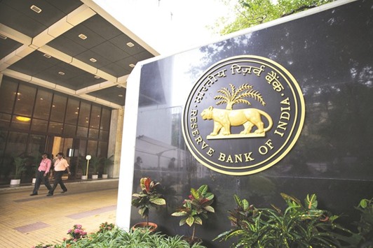 The Reserve Bank of India signage is seen at the entrance to its headquarters in Mumbai. The central banku2019s six-member monetary policy committee cited concerns about inflation in holding rates in February, with three mentioning the need to shift the policy stance to u201cneutralu201d from u201caccommodative,u201d minutes from the meeting showed.