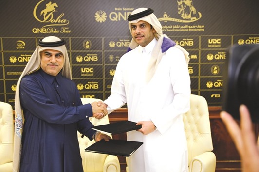 Qatar Equestrian Federation president Hamad bin Abdulrahman al-Attiyah (right) and Mohammed Abdulkarim al-Emadi, CEO of the Al Emadi Enterprises, at a sponsorship signing ceremony.  PICTURE: Garsi Lotfi