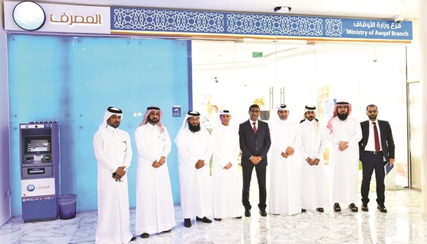 QIB officials at the newly-opened branch.