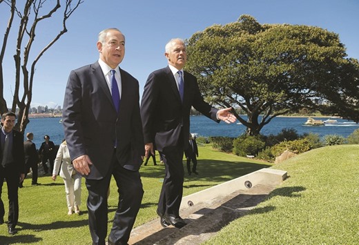 Israeli PM Benjamin Netanyahu (left) walks with Australian PM Malcolm Turnbull upon their arrival at Admiralty House in Sydney, Australia.