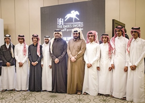 Qatar Racing and Equestrian Club general manager Nasser Sherida al-Kaabi with a group of Qatari riders who will participate in the Qatari Apprentice Thoroughbred Handicap race on Friday. PICTURE: Juhaim