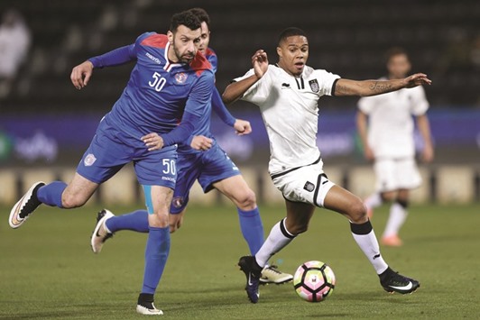Al Shahaniau2019s Mohanad Darjal (left) in action against Al Sadd during their Qatar Stars League match yesterday. PICTURE: Anas Khalid