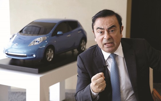 Carlos Ghosn, chairman and CEO of the Renault-Nissan Alliance, speaks during an interview with Reuters at Nissanu2019s global headquarters in Yokohama, Japan, yesterday.