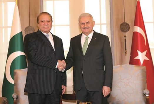 Turkish Prime Minister Binali Yildirim meets with his Pakistani counterpart Nawaz Sharif in Ankara, Turkey, yesterday.