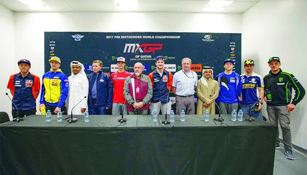 QMMF president Abdulrahman al-Mannai (third left), Losail Circuit Sports Club vice president and general manager Khalid al-Remaihi (fourth right) along with riders and other officials during the press conference held at Losail Circuit yesterday.