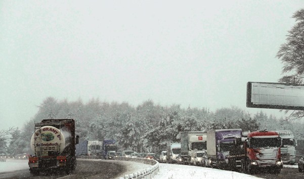 North bound traffic queues on the A9 following snowfall near Perth in Scotland, Britain, yesterday