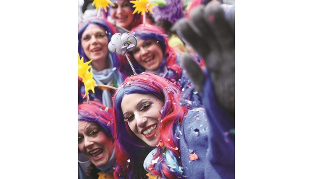 Carnival revellers celebrate the start of the festival yesterday in Duesseldorf, western Germany.