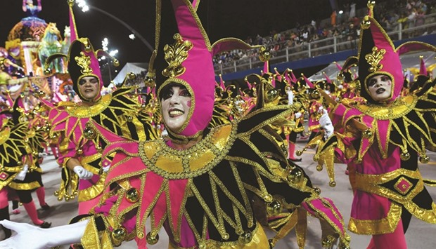 Revellers of the Academicos do Tucuruvi samba school perform during the first night of carnival parade at the Sambadrome in Sao Paulo.