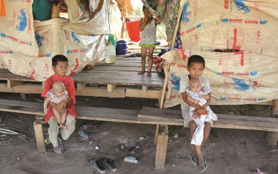 Children displaced by fighting in Kayin State in a makeshift shelter