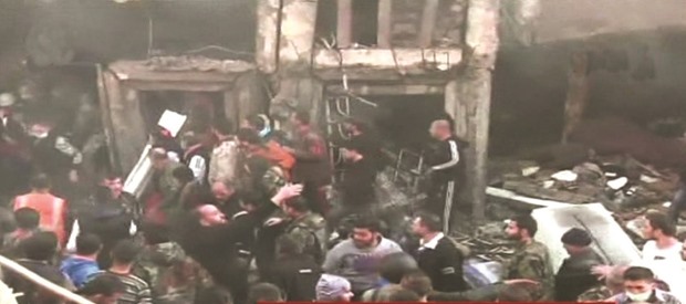 An image grab taken from a video broadcasted by the Al-Ikhbariya Al-Souriya TV channel yesterday shows the aftermath following a suicide attack on two security service headquarters in Syriau2019s third city, Homs.