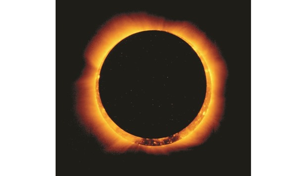 In this handout provided by Nasa, sun spots are seen as the moon moves on May 20, 2012 into a full eclipse position after reaching annularity during the first annular eclipse seen in the US since 1994. A spectacular u2018ring of fireu2019 solar eclipse today will regale skygazers in South America and southern Africa, with seafarers in the nearby Atlantic getting a front-row view too, astronomers say.