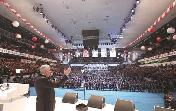 This handout photo released by the Turkish Prime Ministeru2019s Press Office shows Yildirim giving a speech during a public meeting yesterday at Ankarau2019s Arena to garner support for an April referendum on boosting the Turkish presidentu2019s powers.